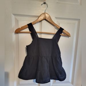 Black Eyelet and ruffle tank top for girls.